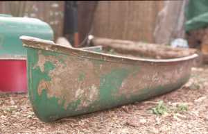 Canoe Chairs: The canoe before power washing